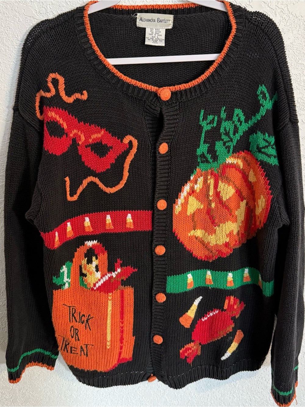 Alexandra Bartlett Black Sweater with Orange Trim